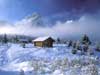 3D Kerstkaarten, een kerstkaart met een besneeuwd landschap in mistige bergen