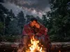 Romantic campfire under the starry sky